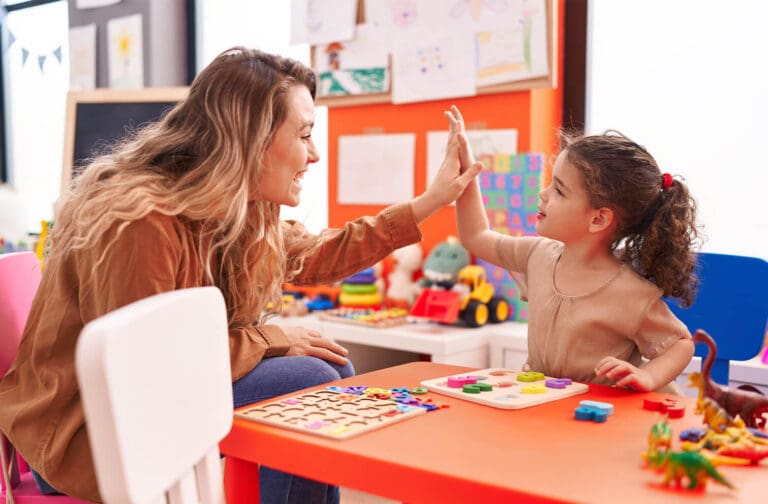 Parent touring Starfish Early Learning Centre with child, exploring safe play areas and engaging with caring educators