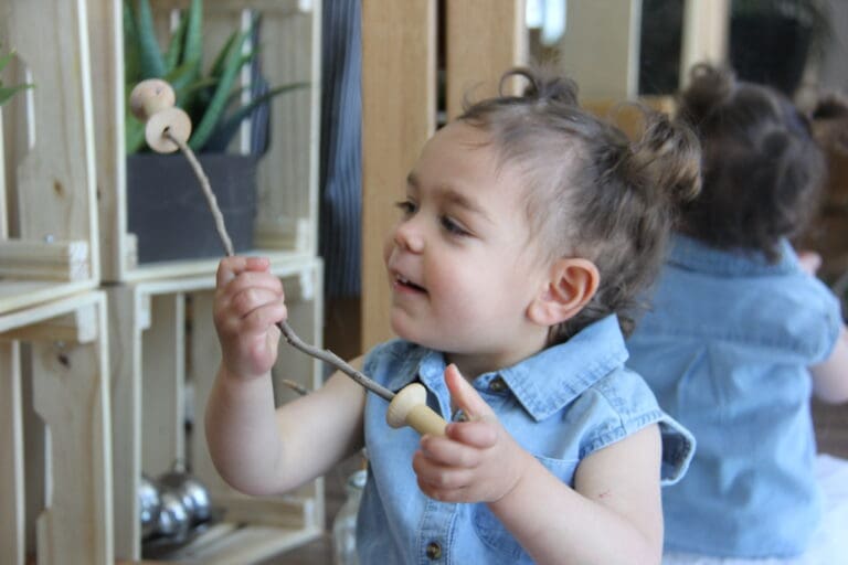 Child confidently engaging in play-based learning at Starfish Early Learning Centre to build independence