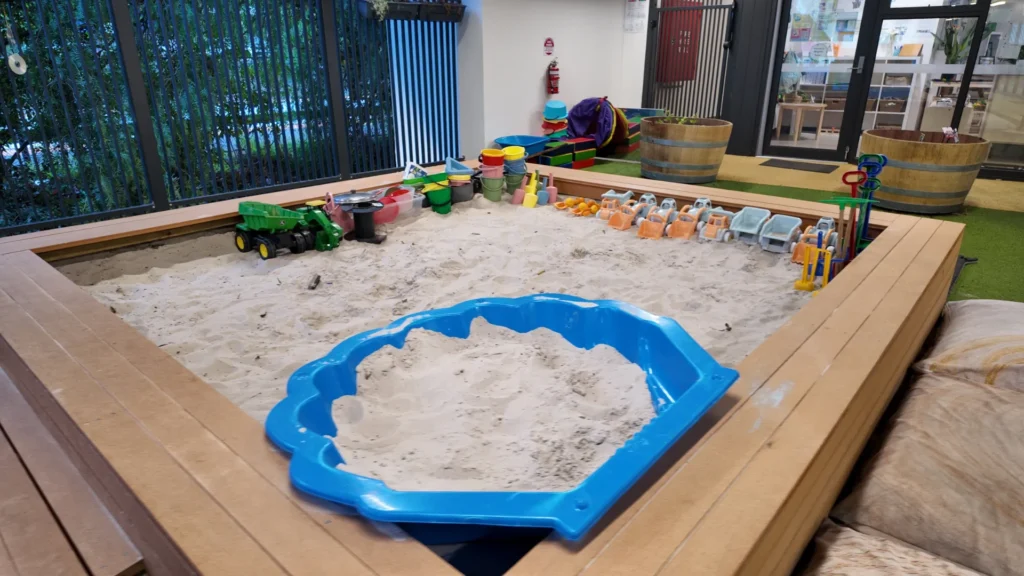 Outdoor sandpit and sensory play area at Starfish Early Learning Centre Essendon