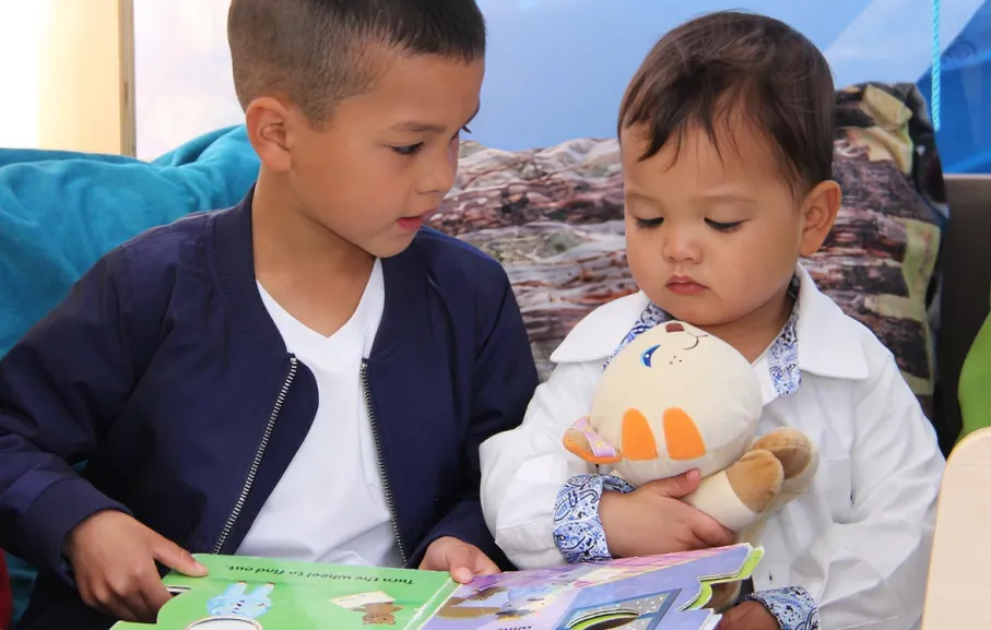 Children engaging in early learning and reading activities at Starfish Early Learning Centre.